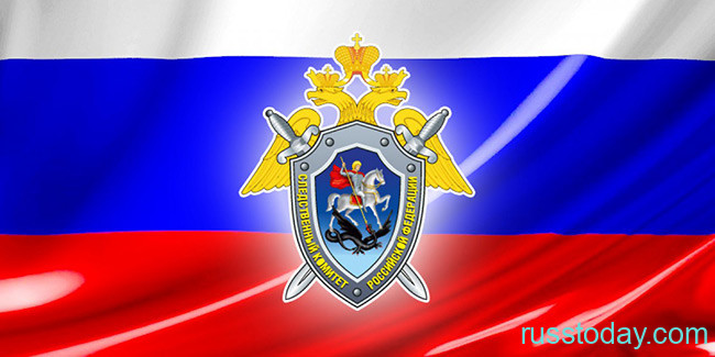 Герд Следственного комитета на фоне флага РФ